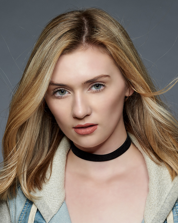 A model actor headshot for her model portfolio made by The Light Committee