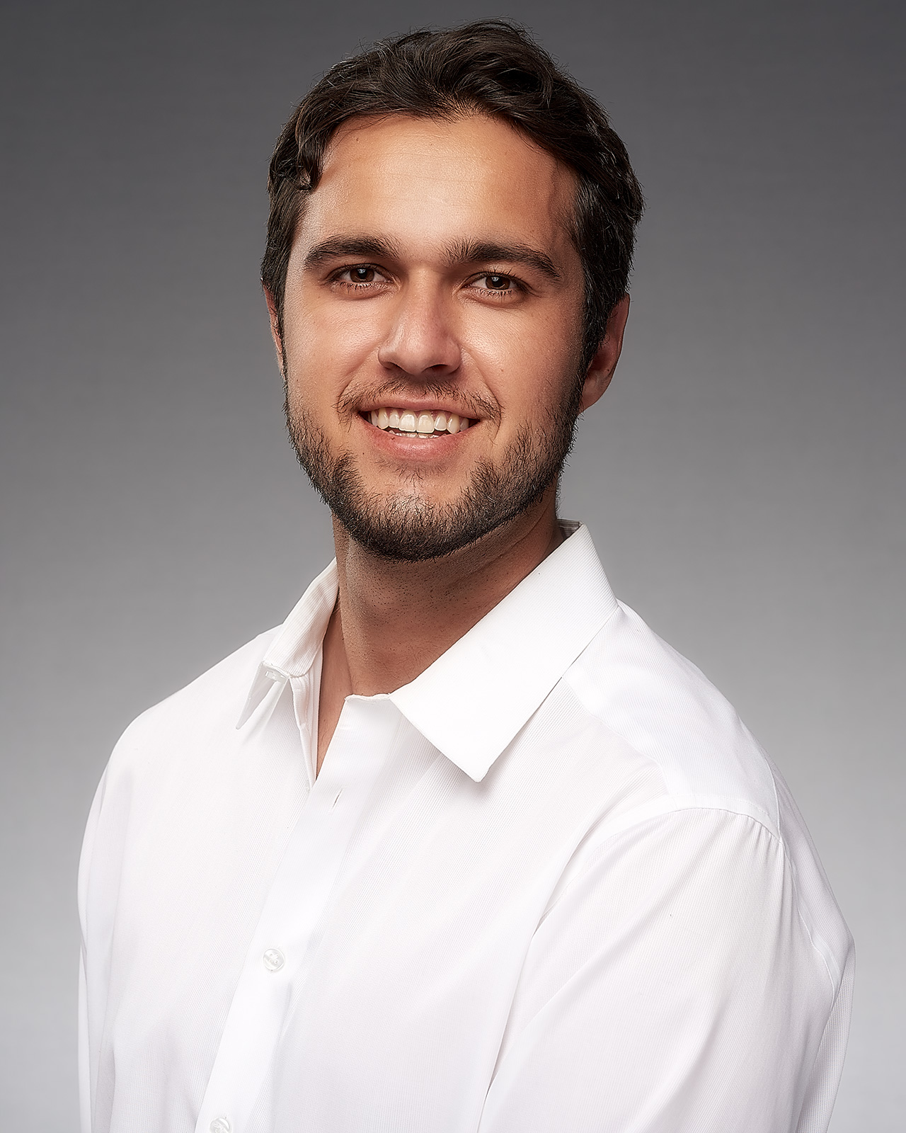 A man in a ERAS medical residency headshot in Los Angeles made by The Light Committee