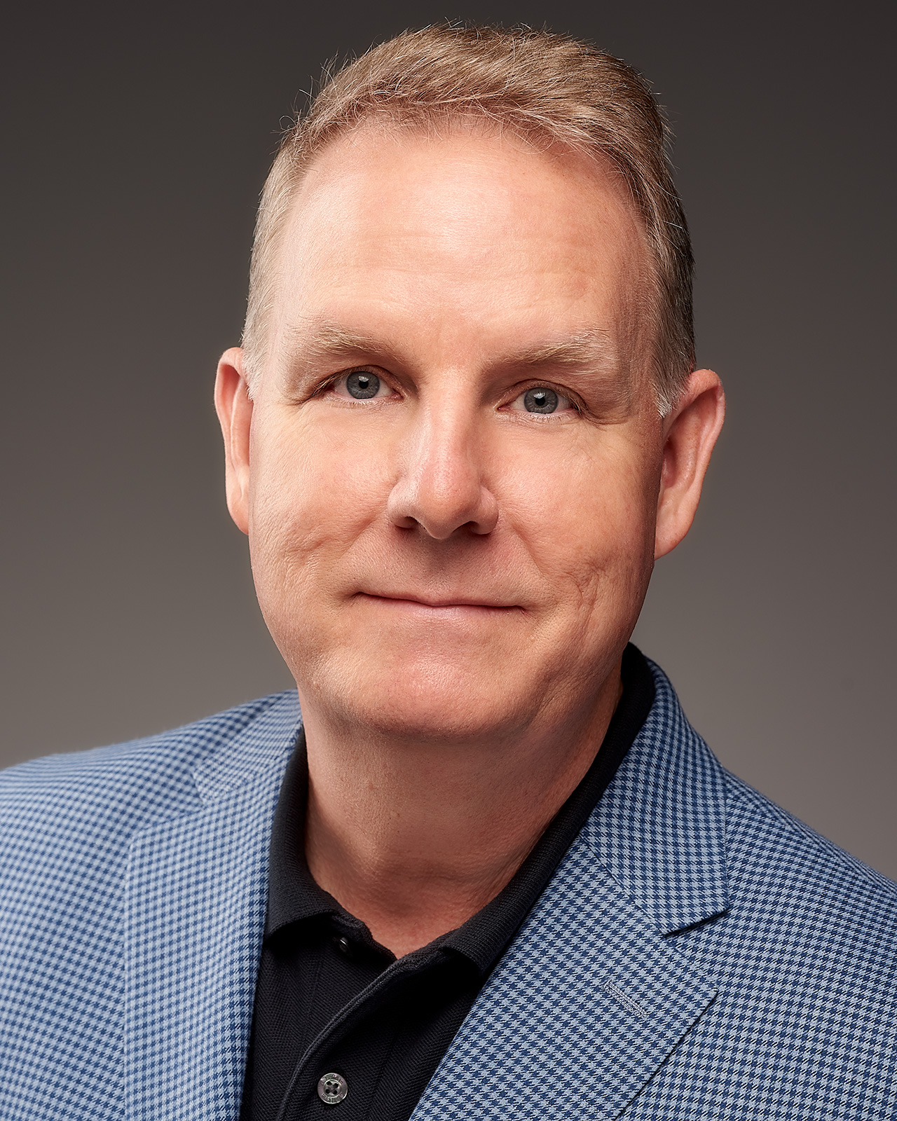 A realtor in a headshot in Los Angeles made by The Light Committee