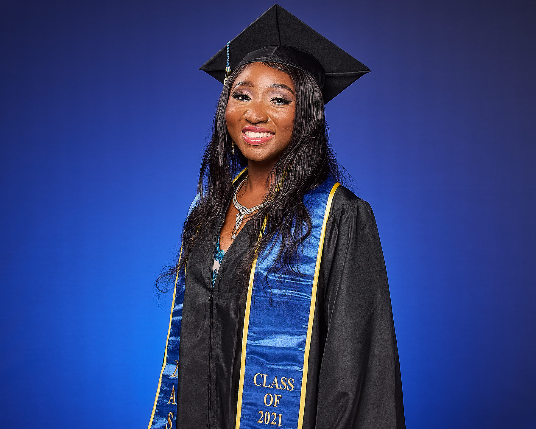 A graduation portrait made in a studio in Los Angeles by The Light Committee