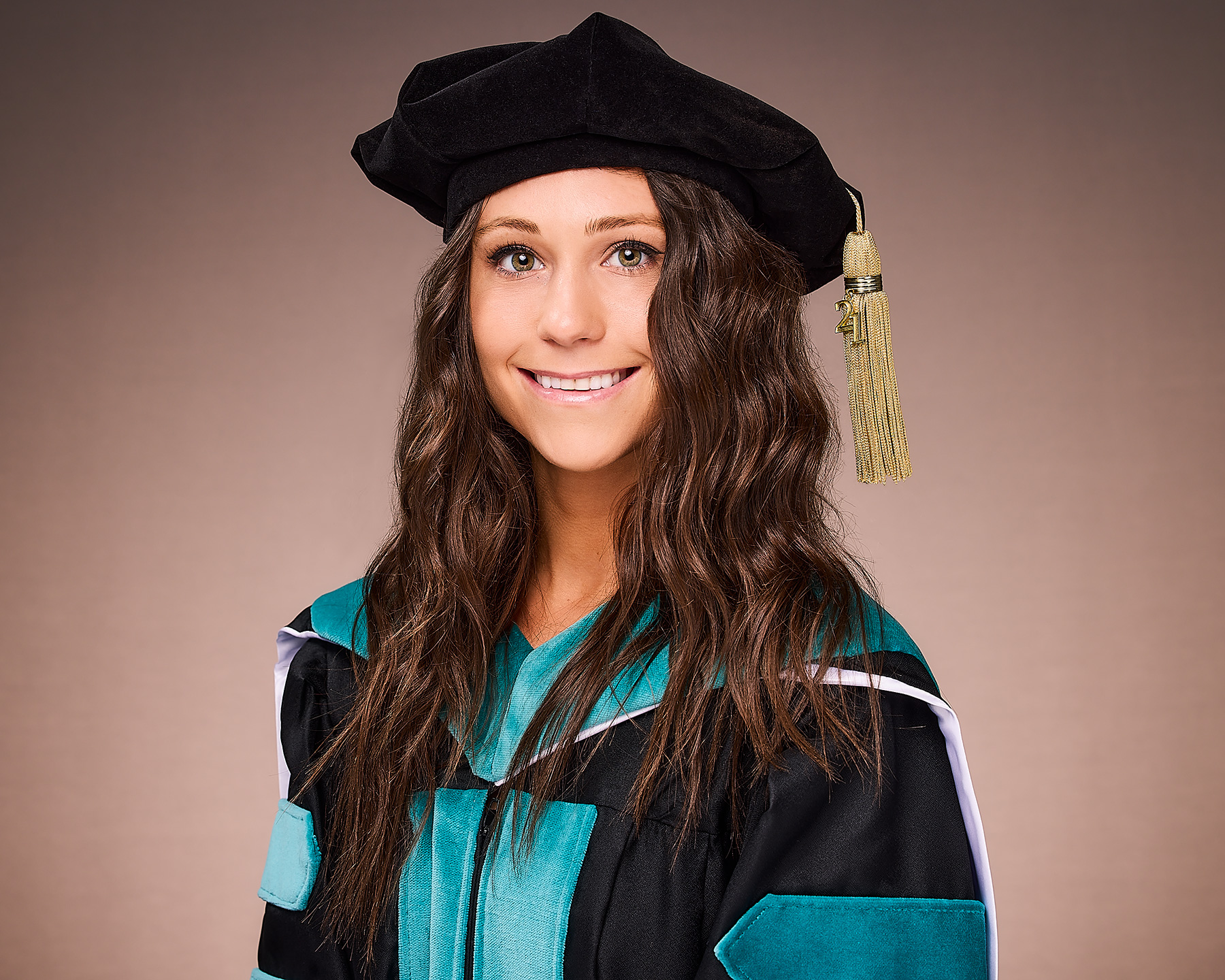 A graduation portrait made in a studio in Los Angeles by The Light Committee
