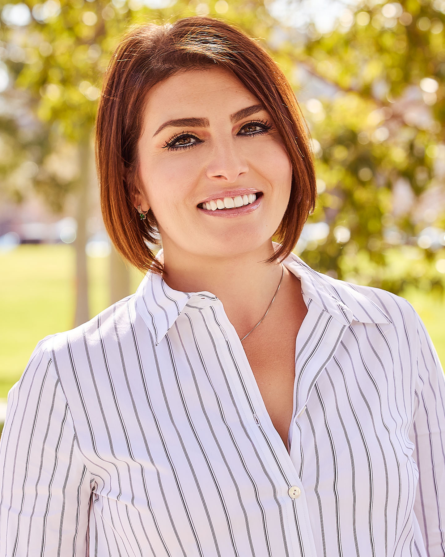 A woman in a corporate headshot in Los Angeles made by The Light Committee