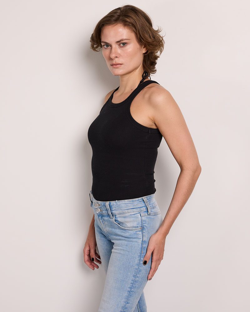 An example of a woman in modeling digitals with a Polaroid style.