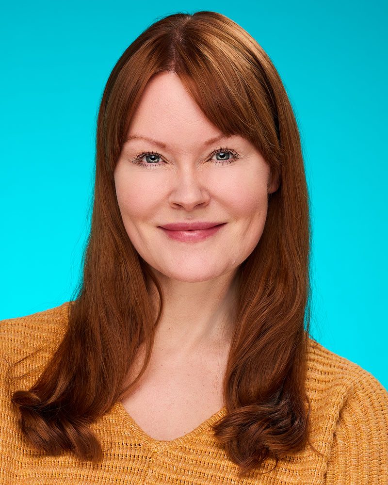 red head woman in a commercial acting headshot Los Angeles
