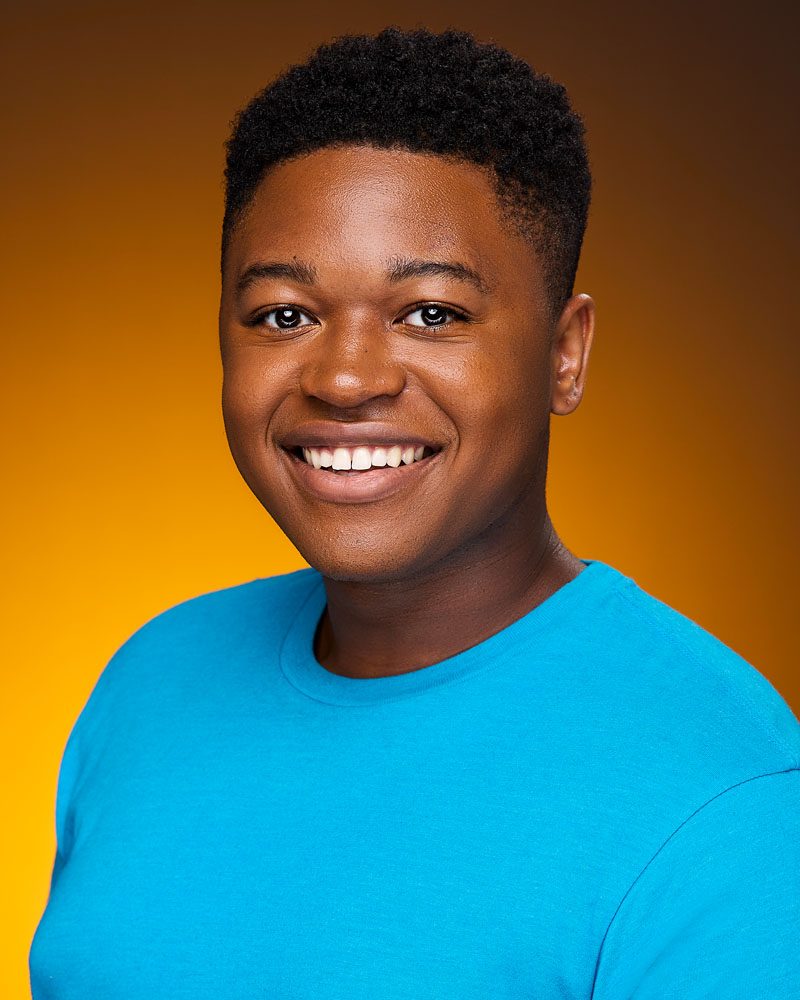 vibrant colorful commercial acting headshot of a man