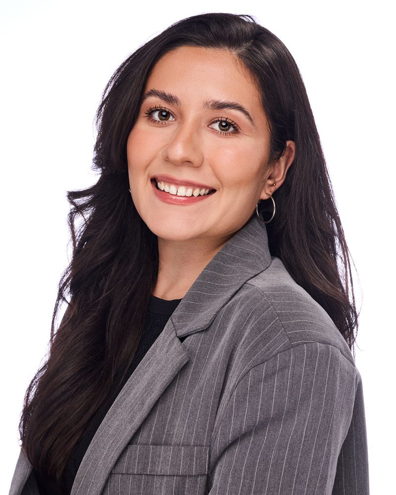 white background studio headshot of a woman with modeling digitals in Los Angeles