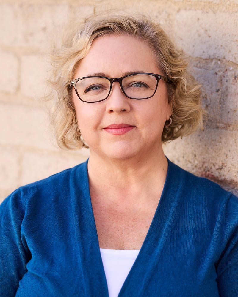 A professional headshot of a woman outside in Los Angeles