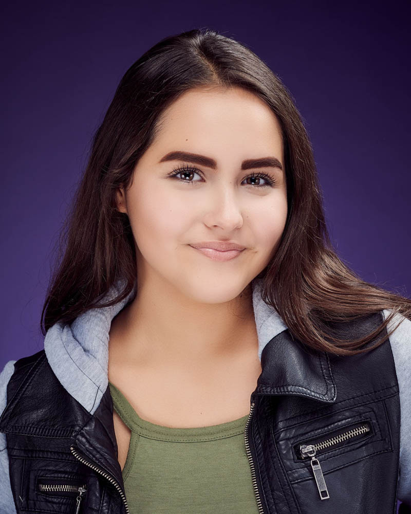 teen girl commercial acting headshot in a studio near Encino with a purple background