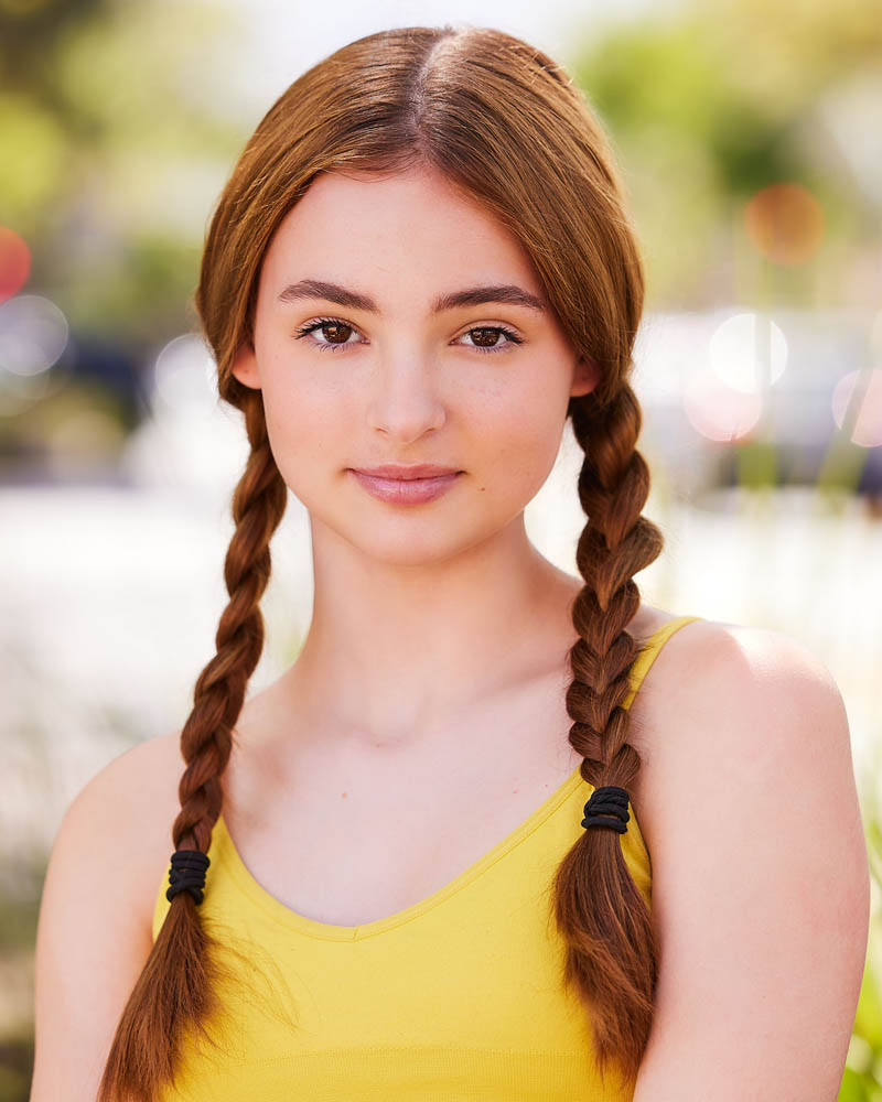 teen girl commercial acting headshot outside in natural light near Pasadena with a light background