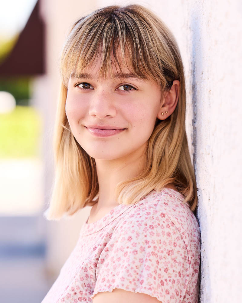 teen girl commercial acting headshot outdoors near Pasadena with a blurred background