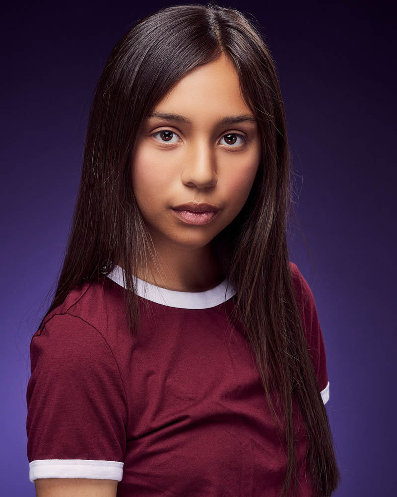 teen girl acting headshot in a studio near Pasadena with a purple background