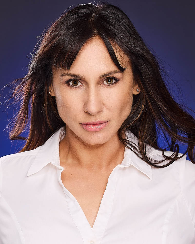 A cinematic actor headshot of a woman in a studio near Los Angeles